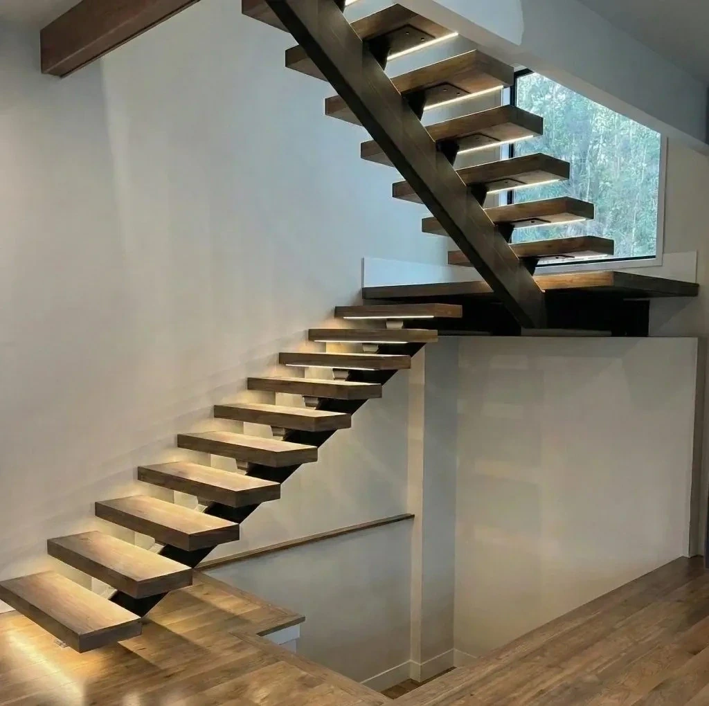 Mono-stringer floating staircase with wood treads and integrated LED lighting in Tukwila, WA